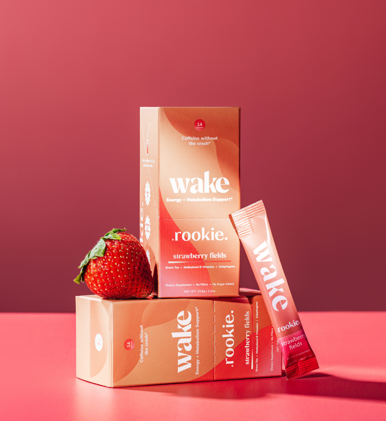 Rookie Wake strawberry fields product packaging with a strawberry on a red background